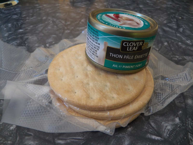 A boater's lunch.  Pilot bread and tuna.  The little cans are only available in Canada and have a "best by" date about two year's out.  No can opener needed.  Pilot bread is "good" for decades.