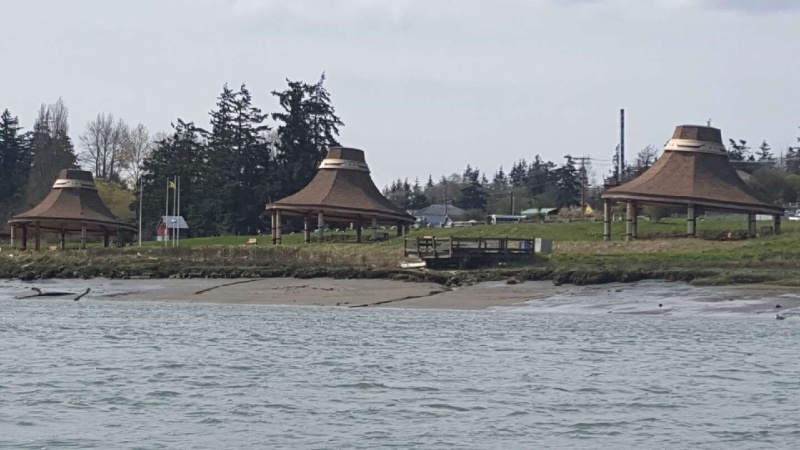 A view across the channel of the Swinomish tribe's "cedar hats"