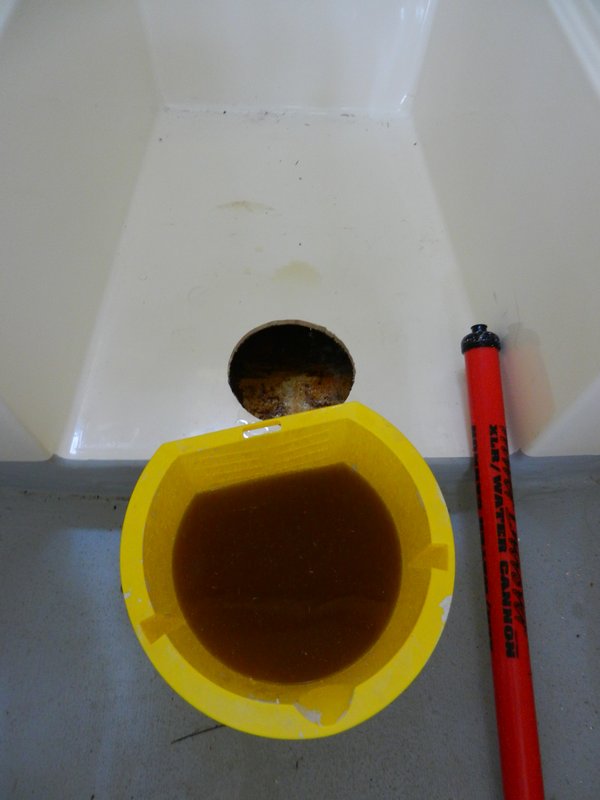 About 2 gallons of (nasty) water in there!