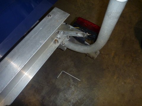 Added gussets to light and licence plate bracket. Next need to add a loop of stainless steel stranded wire to loop around the frame and licence plate. The new bracket is also thicker adding the bottom gusset was a loser as it had to be cut away some to clear a bolt. The old bracket is laying on the floor