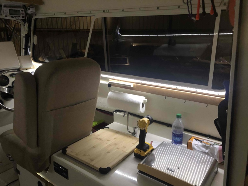 Added LED Light,  so much better than the light above.