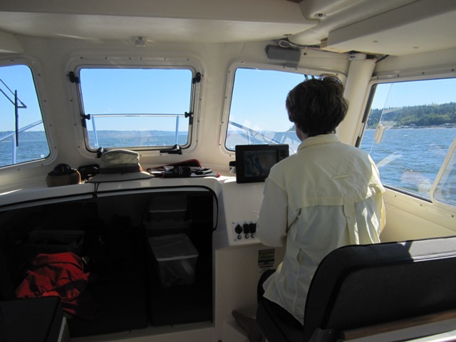 Ann at helm