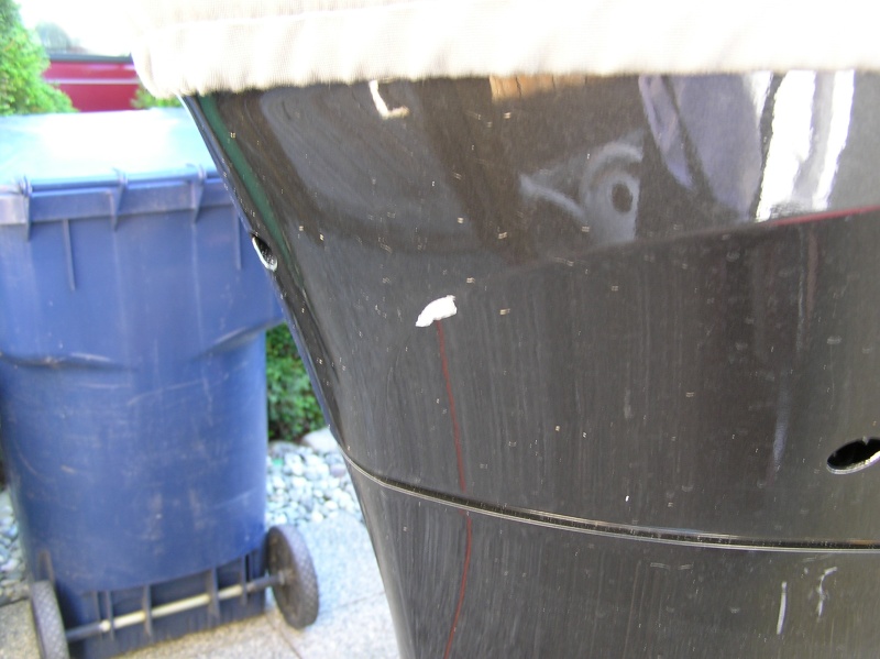Another issue that is solved.  The swim step would hit the engine when I turned full to starboard as evidenced by the small damage to the cowl.  No more.  I'll make sure to mount it w/ 1" or so of clearance now.