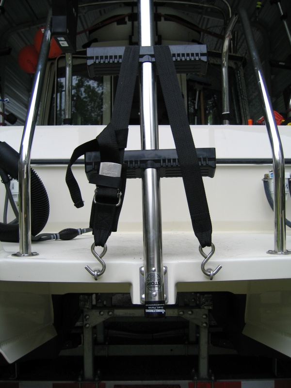 Another way to store the swim step, two ss eye bolts, nylon bushings, and a tie-down strap.