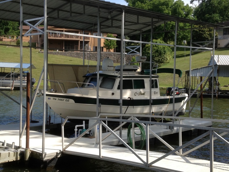 At home.
Except for a few C-Brat gatherings spent the rest of it's time in fresh water. 
Stored on lift in covered slip with @520 hours. That's as close as you can get to "Only to church on Sundays"
