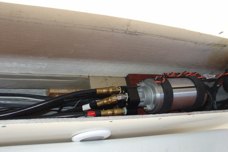Autopilot pump underneath starboard coaming box