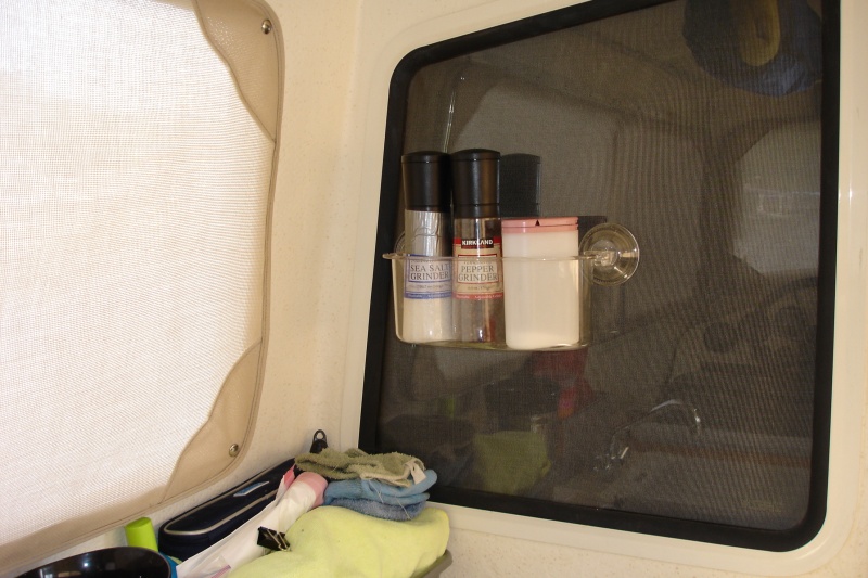 Bed Bath & Beyond suction rack. Sticks to glass or cabinets.