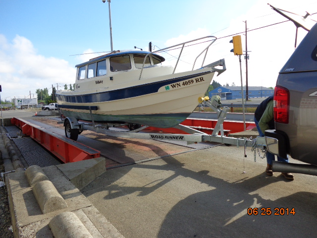 Bellingham 6-25-2014: Checking the weight of the boat with full fuel tanks and other misc on board.