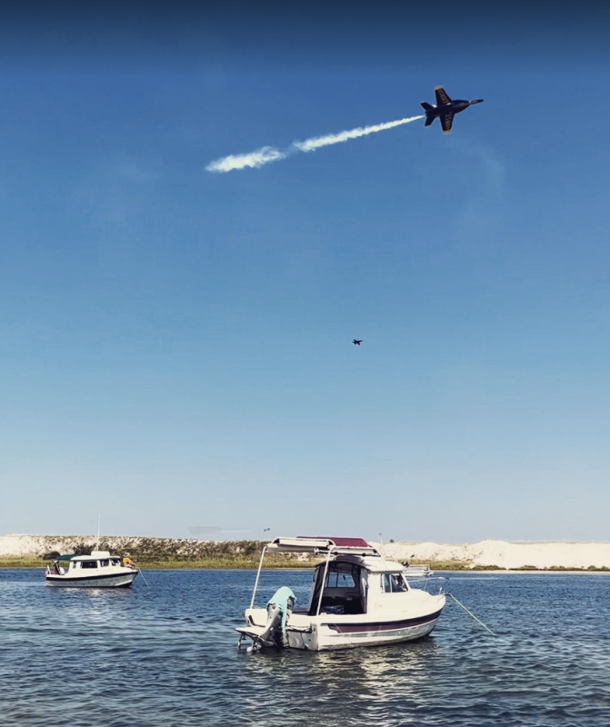Blue Angels flying over two C-Dorys. Ft McRee, Pensacola Fl