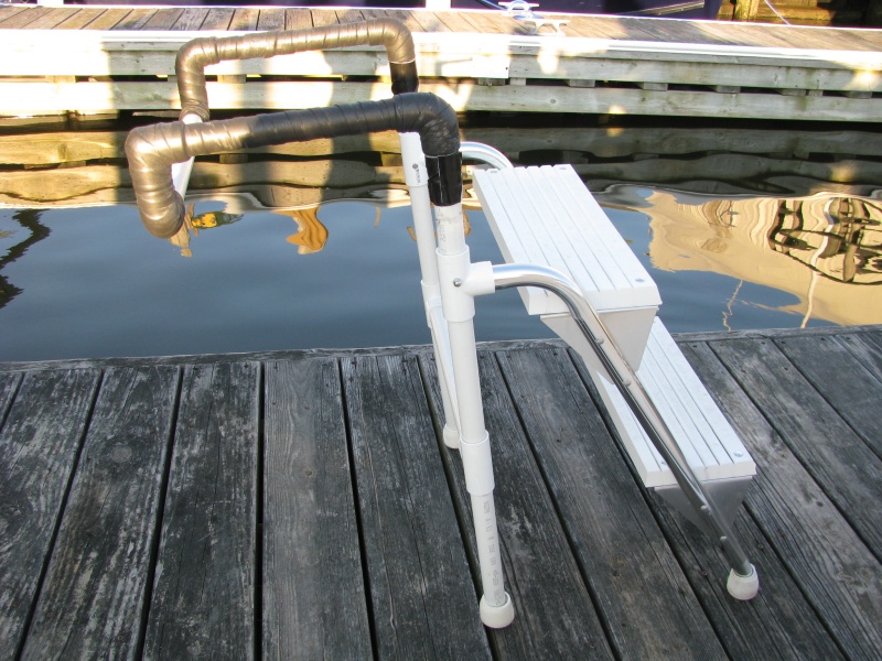 Boarding Ladder close up of rear legs.  This ladder makes it easy for my wife and I to enter the boat.  The rear legs provide extra support for my 250 pound frame