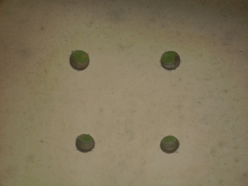 Bottom view of factory floorboards.  Holes were coated with epoxy.