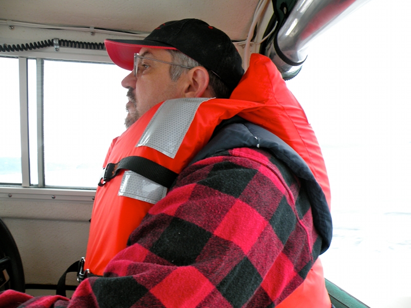Brian at the helm in Fritz Cove on Labor Day