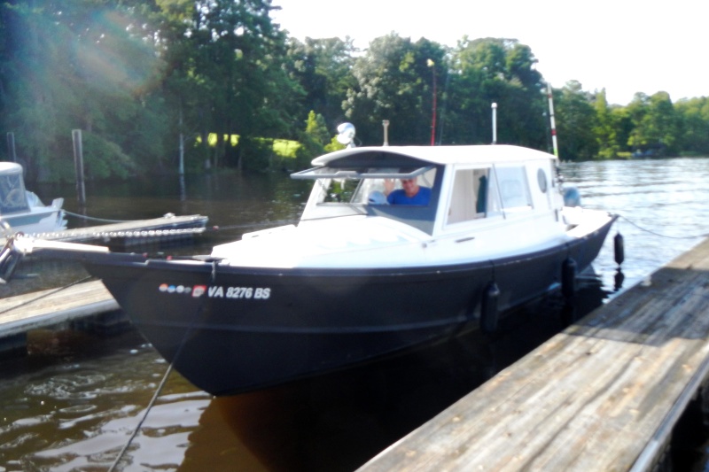 Bruce on RIVER HORSE moored at River's Rest