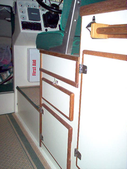 Built a 4" booster for the helm seat.  Adds room for log and maps.