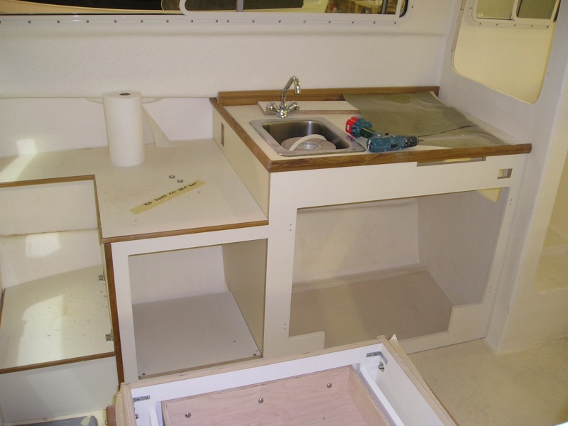 Cabinets with kick plate cutout.