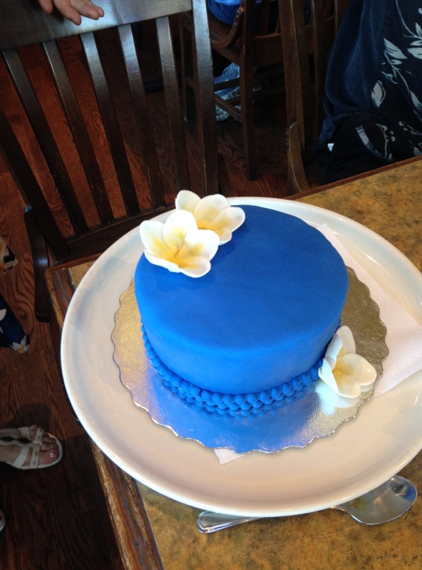 Carolyn\'s buddy made a cake to match her Hawai\'in dress