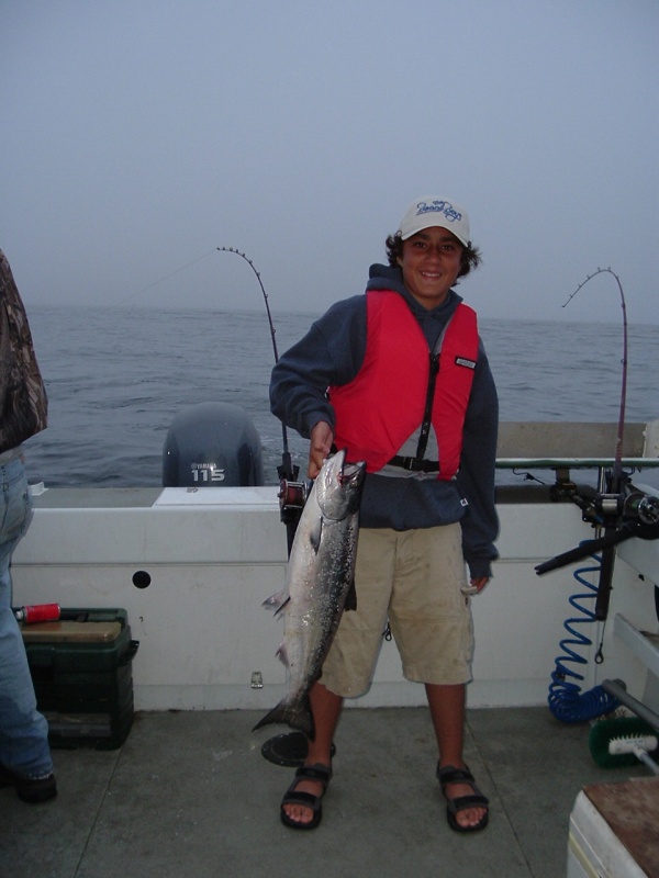 Casey and his first salmon. This photo appeared in the "Kid's Gallery" of Saltwater Sport Fishing Magazine