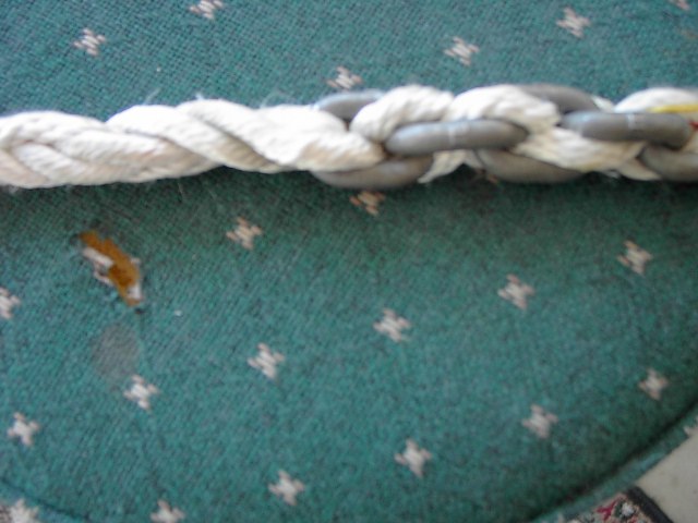 Chain/Rope Splice: After weaving the third strand back into the rope, the third strand is sewn to the other three in the rope for added strength.