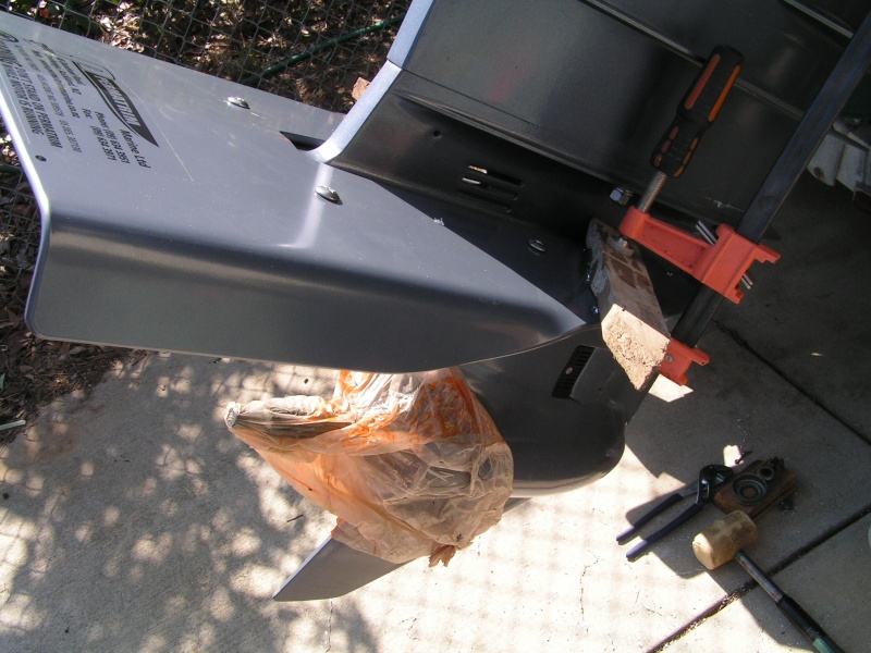 Clamped on each side, drilling holes, notice bag over prop spindle to avoid shavings.