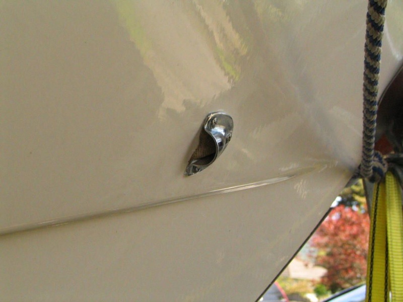 clamshell covering stainless drain tube. Note screen to keep bugs out.