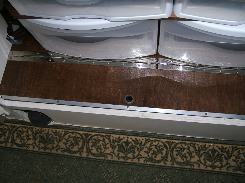 closer view - wooden cleat below prevents floor door-lid from dropping