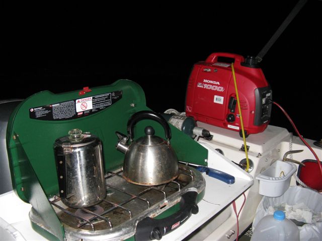 Coleman stove ready for morning and Honda power for cabin heater