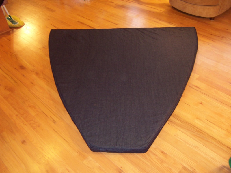 Cushion cover sewn by Junction House in Dawson Springs, KY with 3" memory foam inside. Memory foam cushion is placed on top of factory foam cushion and makes a considerable difference in sleeping comfort.
