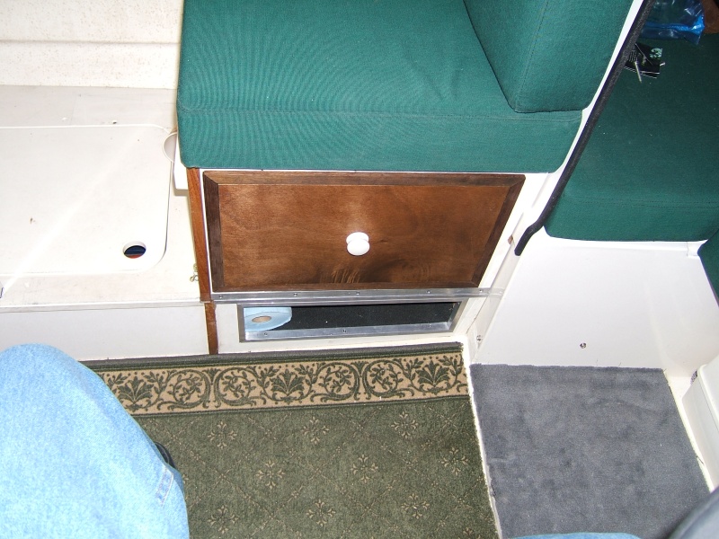custom drawer and separated storage below front seat