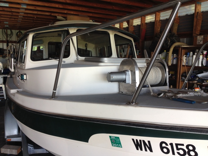 Custom made deck winch with 300 feet of rode and chain.