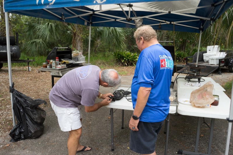 Dave and Marc set up for surgery on the pig....Now putting the blade in a Sawzall is not rocket science...or is it?