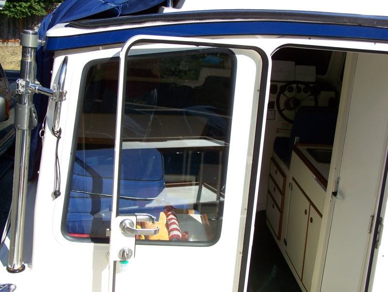 Davit support with arm removed to prevent interference with storage cover