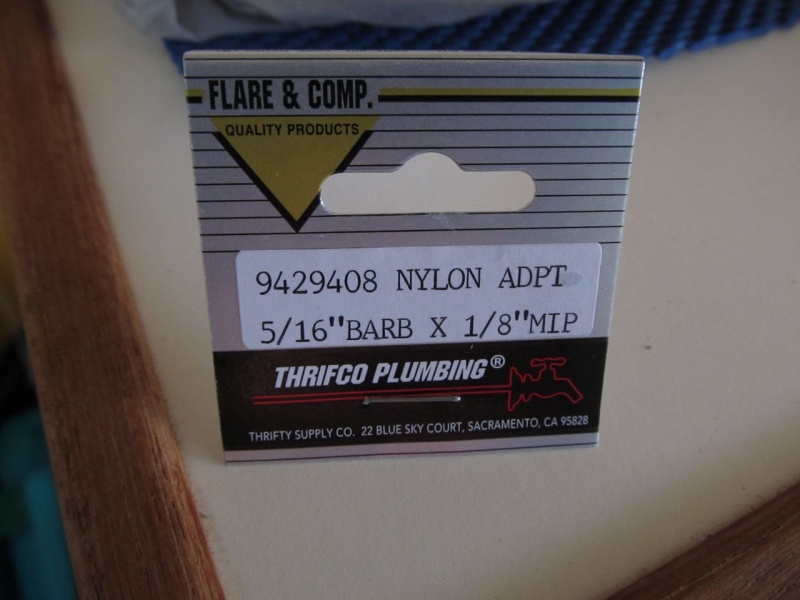 Decided to add vent hoses since it would be pretty easy and inexpensive.  Bought three nylon fittings at the hardware store, 1/4" male NPT to 5/16" hose barb, plus 8' of 5/16" clear hose.  Tested friction fit in store - plenty good enough so no hose clamps needed for this setup.