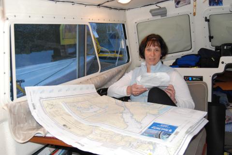 Dee helping plan the next leg of our trip in rainy Ketchikan