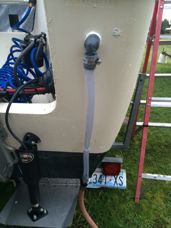 did not want a pick up below water line so we have done this in the past with our boats, while not exactly hidden it has worked well and no worry about core damage.