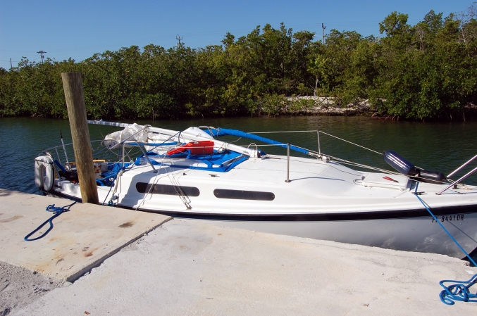 DisMasted "Papillon II" at Marathon Boat Works dock