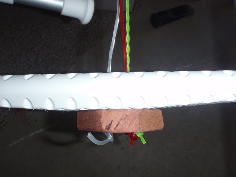 Drill D-ring deck/backplate holes;3M 4200 to backplate in anchor locker;secure D-rings on deck.  This is a simulation of how I held backing plate to underside of deck w/3M 4200 before thru bolting D-rings.