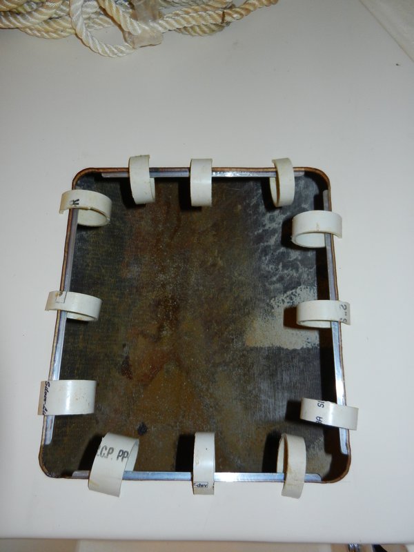 Epoxied aluminum strips to edges under (later to put screws through)