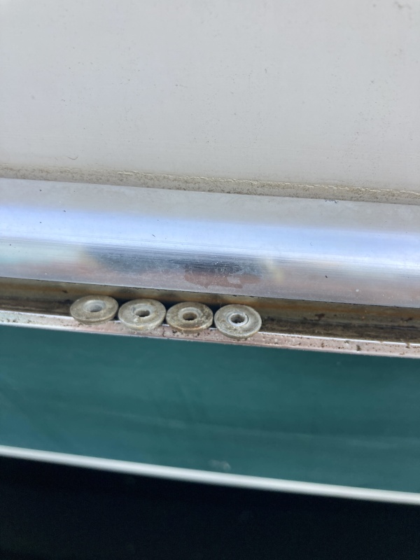 Everywhere I found part of the pop rivet broken off or missing I knew I needed to replace it.