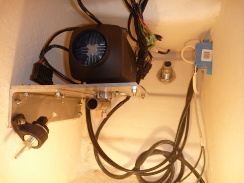 Extra wires behind and below heater are from my binacle control. You know the forward reverse and thottle for the outboard motor, fuel pump on lower left, combustion exhaust w drain centered, drilled and installed new thru hull