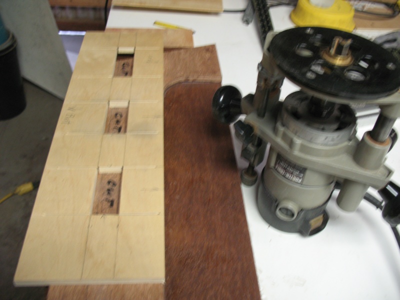 feb. 2011 052 bilge bulkhead is 1/2" marine ply X2 = 1". showing scupper lay-out & template