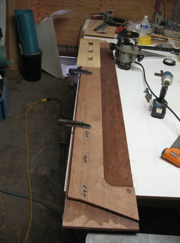feb. 2011 053 scupper template at one end & flipped for other end. first panel only was cut and scribed then epoxied to 2nd.