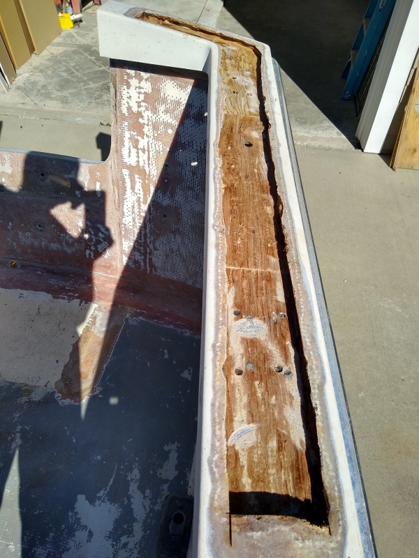 Fiberglass skin and rotted wood removed. Will be filling with Carbon Core pourable as I have some left from transom. Will reskin with polyester and glass.