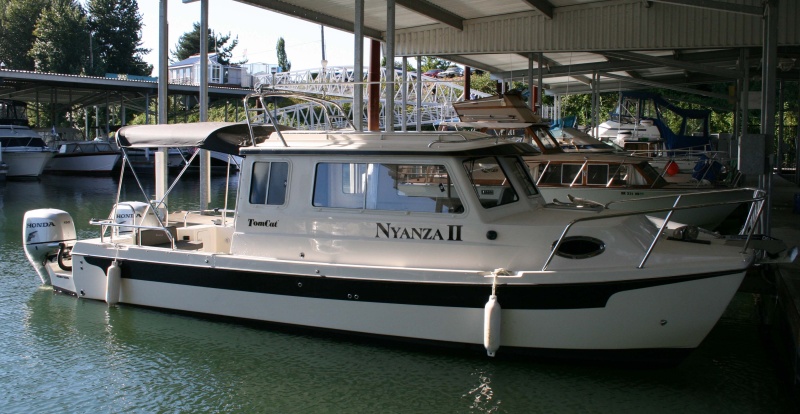 Finally put our name on - "Nyanza II" - also shows our new slip.