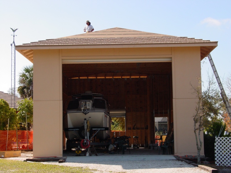 Finish the roof and take a vacation from this barn project.
