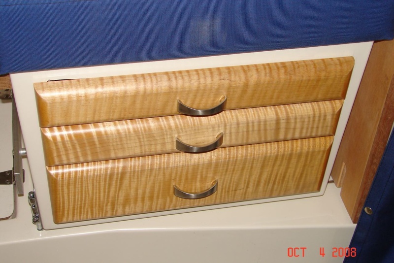 Finished drawers with seat base back in boat.