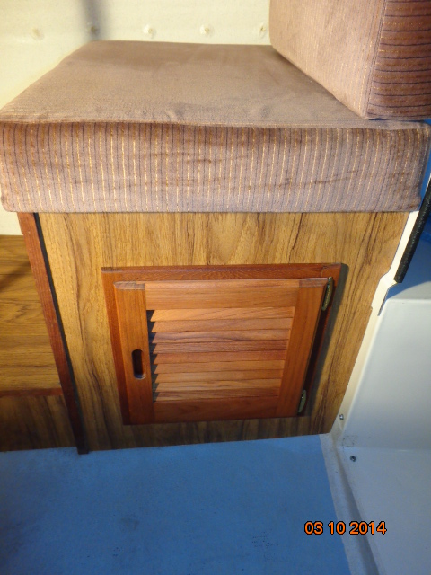 Finished installation of louvered door under front port side seat.