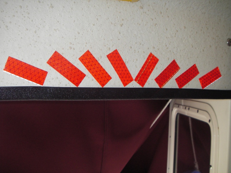 First "modification" is this reflective tape over the door,to help with not bumping heads.