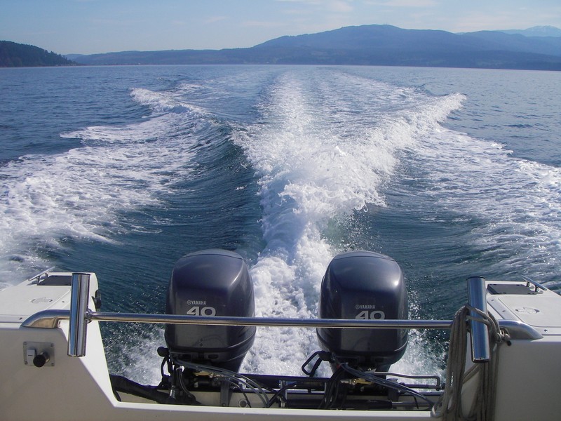 Flat but not glassy day, twin 40's, headed out of Sequim Bay, with "Port" and "Starbird" just loping.