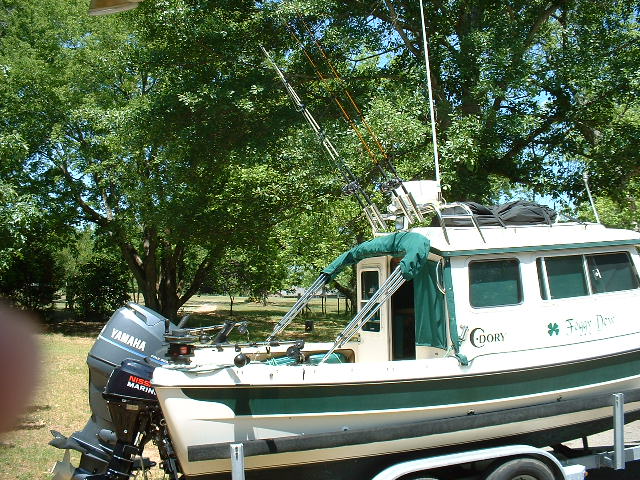 Folded forward for fishing. Should be plenty of room.
