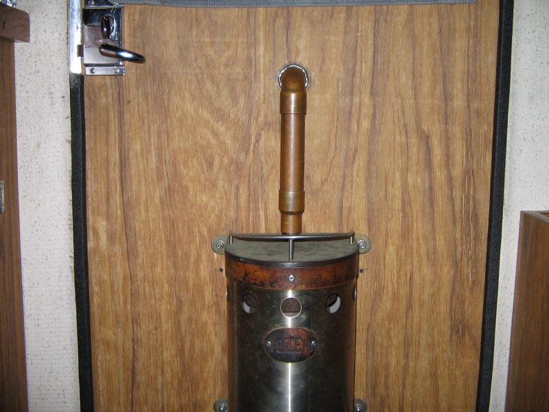 Force 10 Propane heater mounted on inside of door